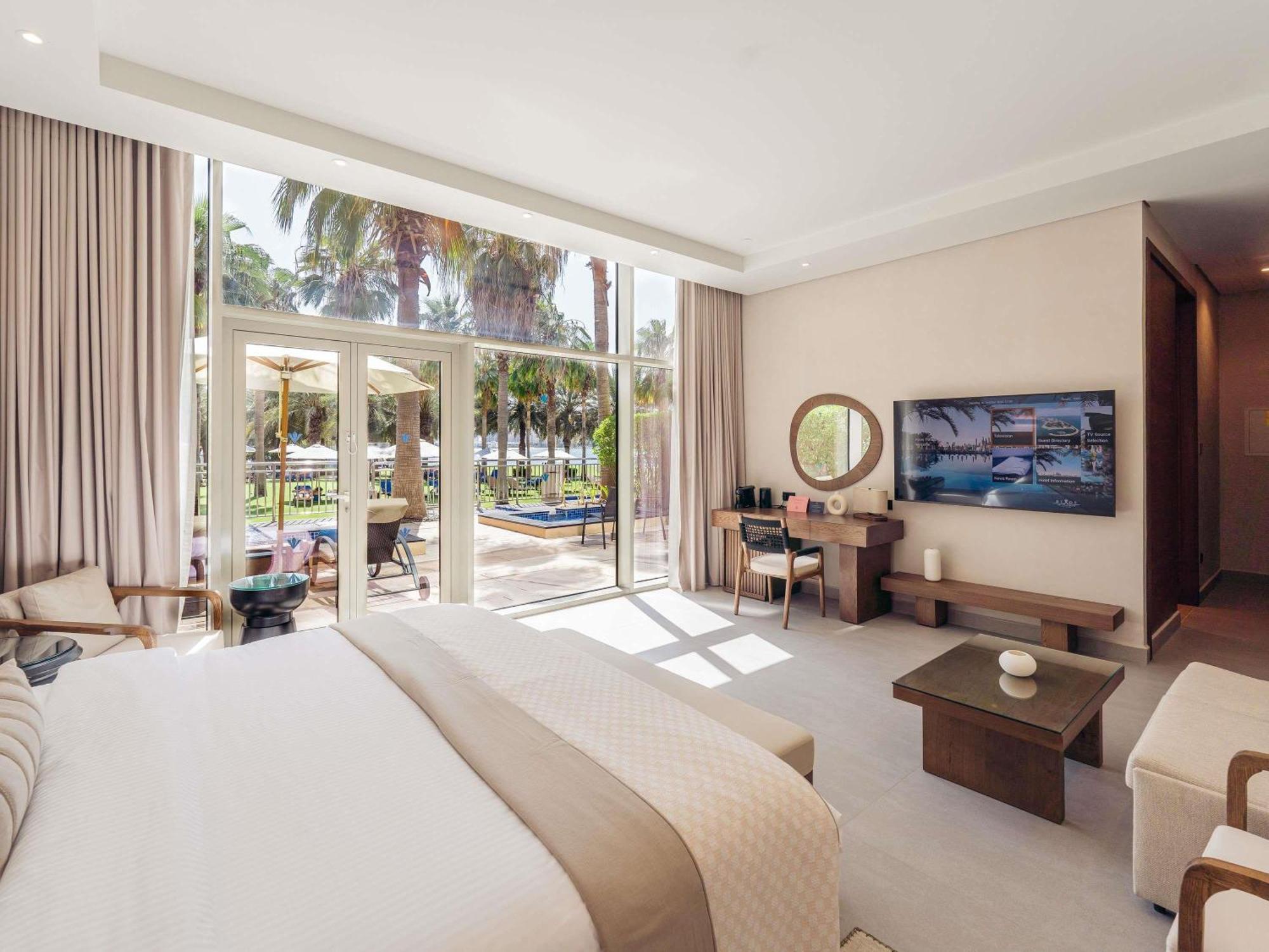 Quarto Wellness com Acesso à Piscina